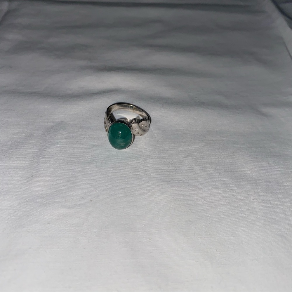 Green and silver ring